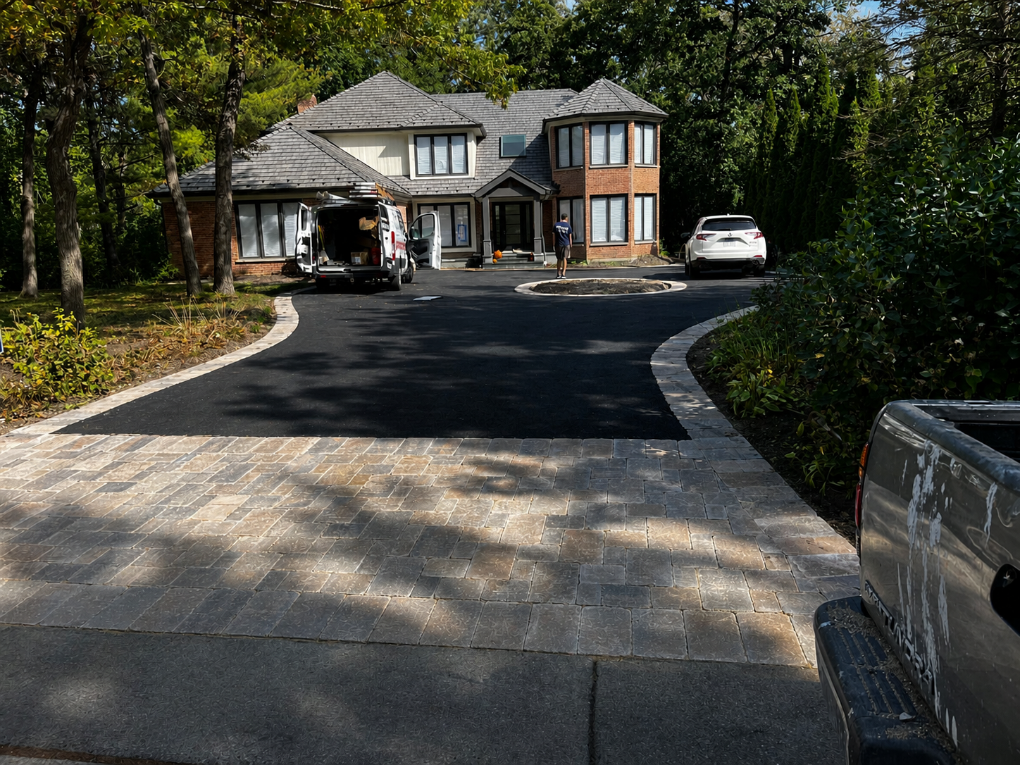 Finished driveway with paver border