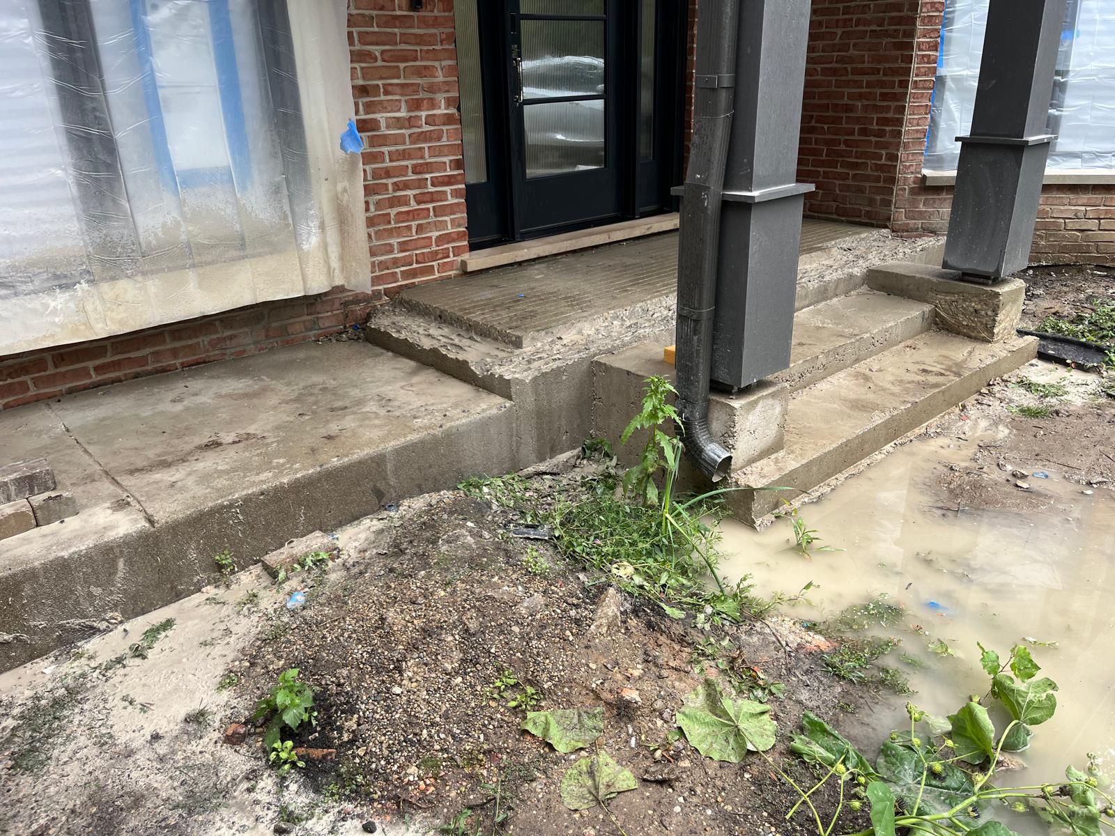 Brick and stone driveway with paver apron