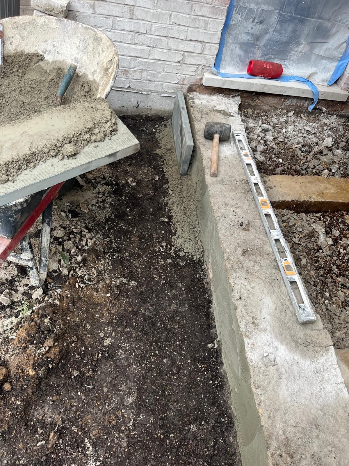Demolition work for brick and stone patio