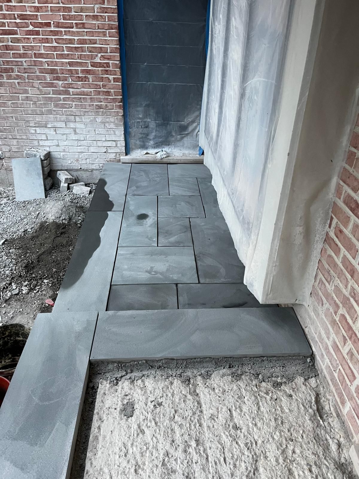 Brick and stone front entry in progress