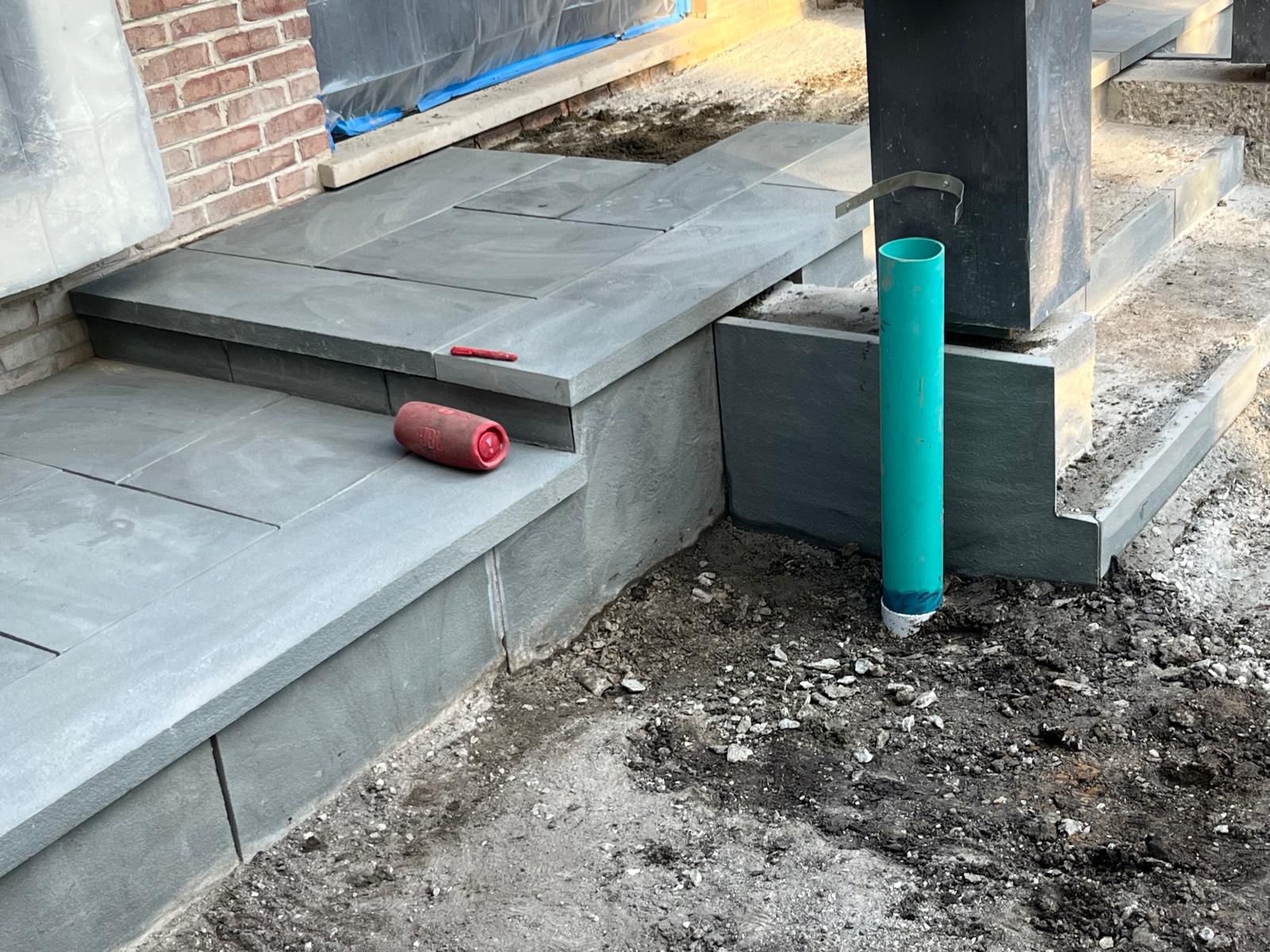 Brick and stone patio installation