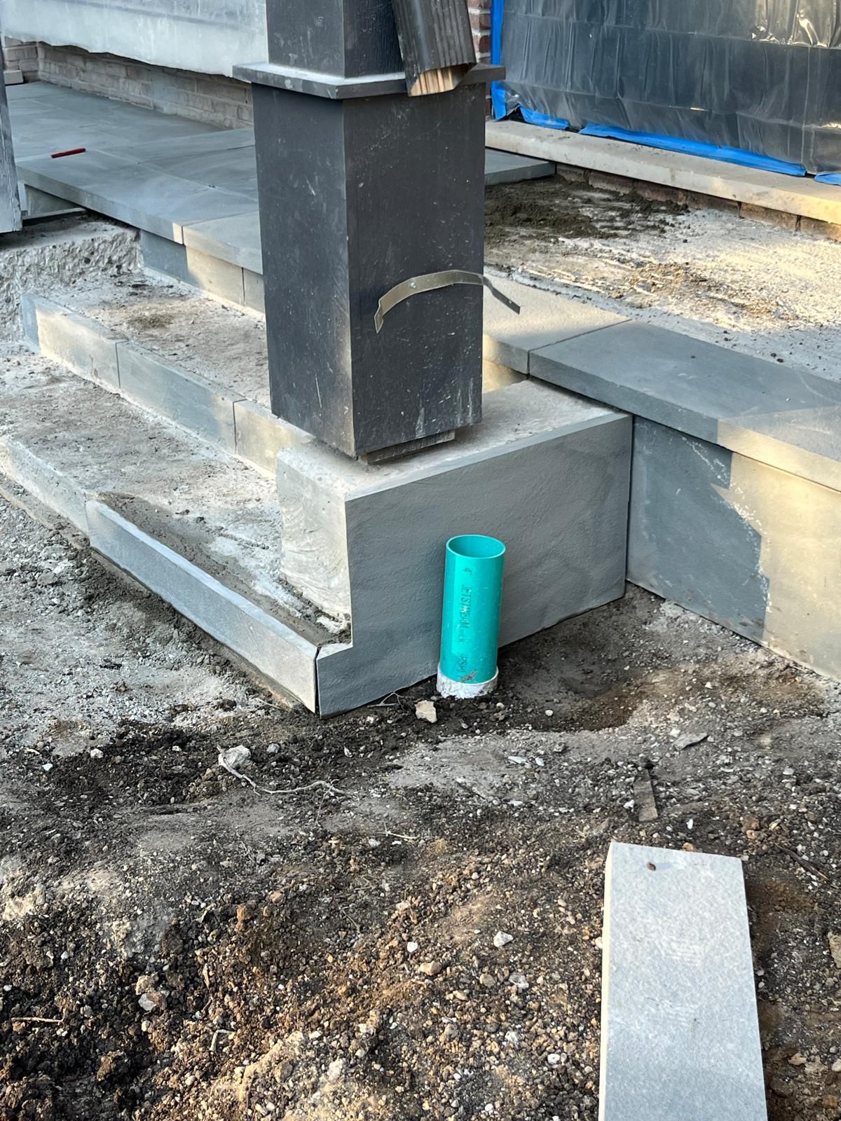 Stone steps with paver landing