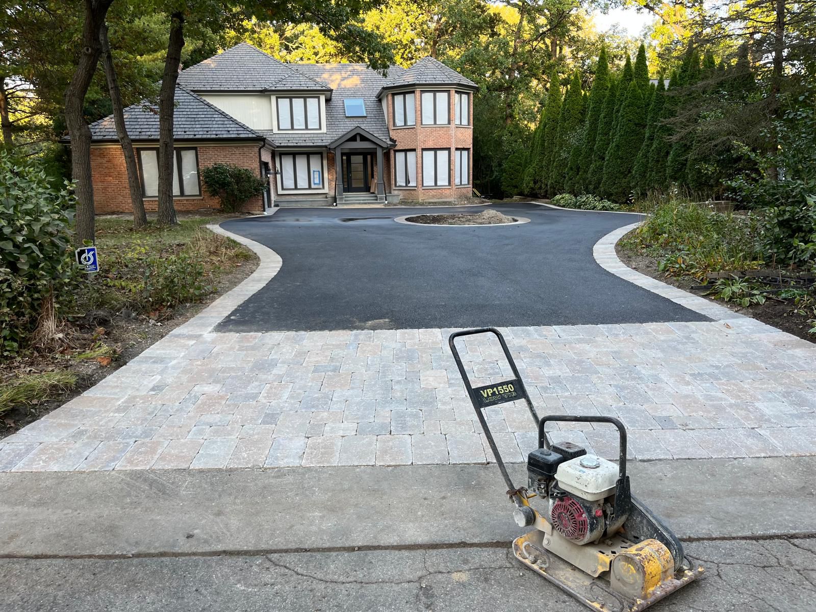 Finished brick and stone driveway apron