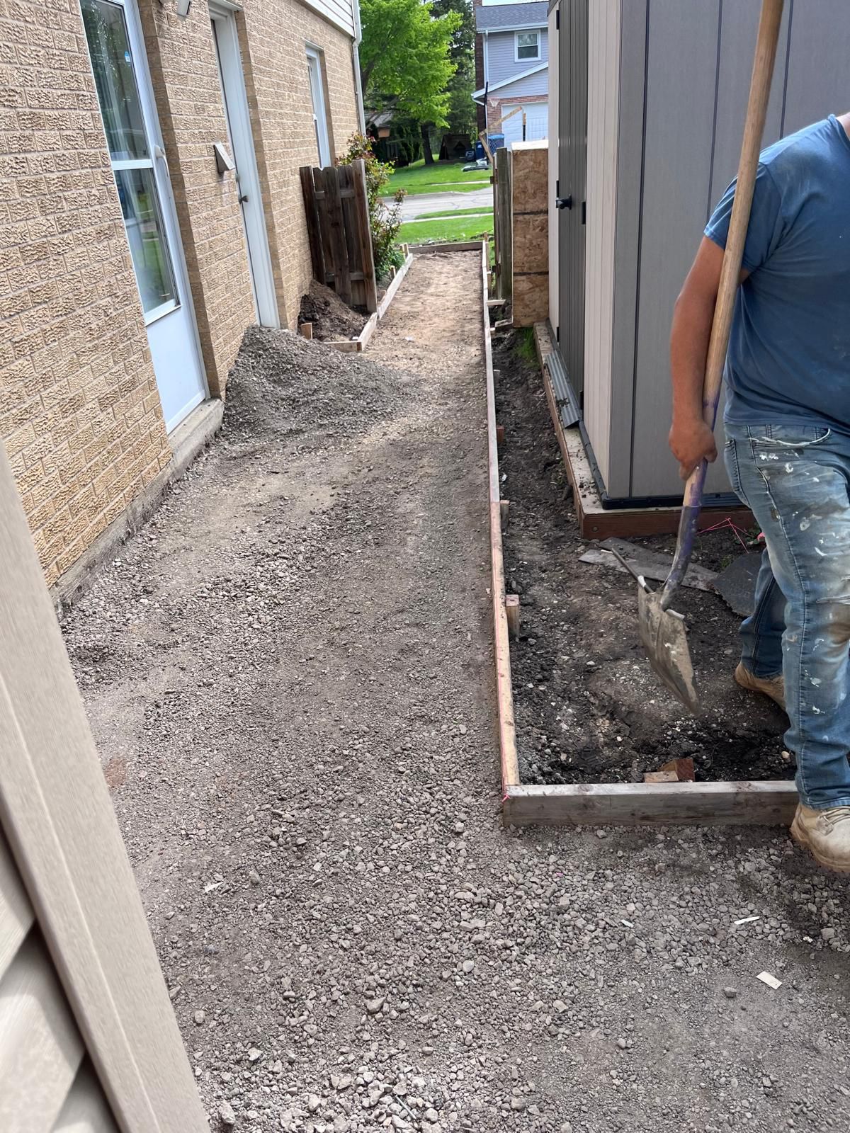 Sidewalk forms and gravel base