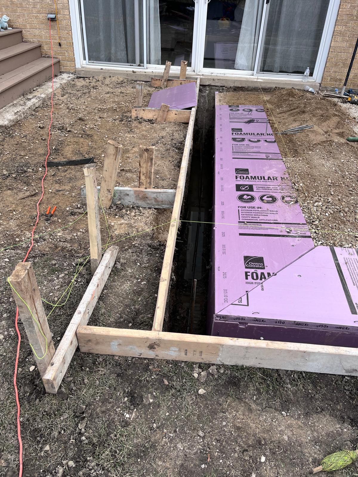 Sidewalk foundation forms and insulation